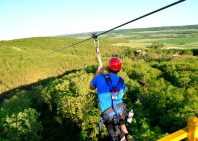 a man is doing Zipline